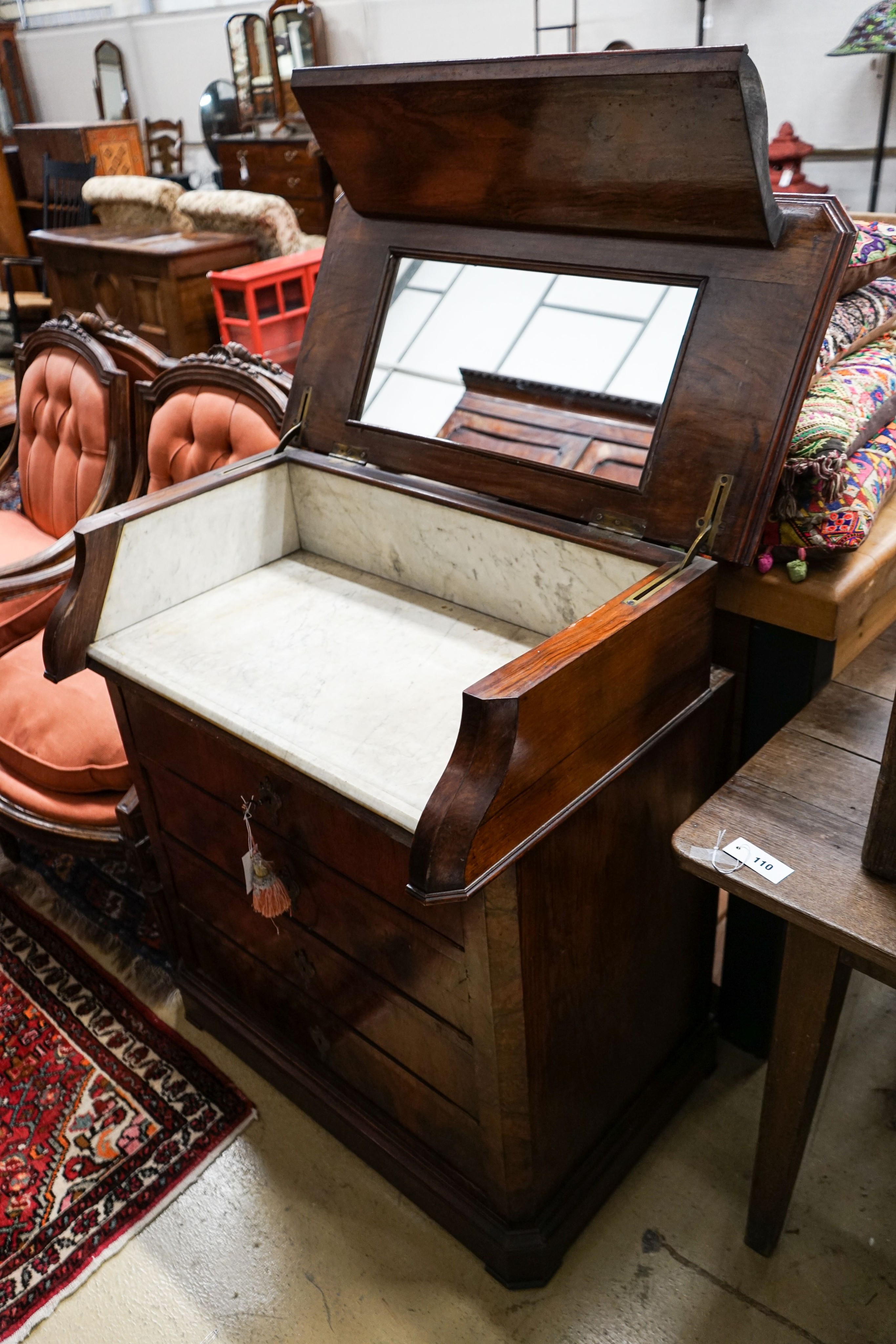 A 19th century French figured walnut washstand with marble lined interior, width 87cm, depth 50cm, height 99cm